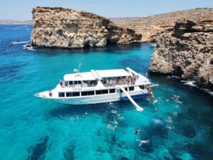 From Sliema: Comino, Crystal Lagoon, and Blue Lagoon Cruise - Crystal Lagoon or St. Nicholas Bay (seasonal): your first taste of turquoise