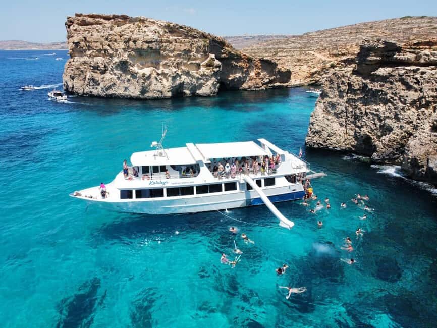 From Sliema: Comino, Crystal Lagoon, and Blue Lagoon Cruise - Crystal Lagoon or St. Nicholas Bay (seasonal): your first taste of turquoise