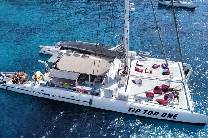 Full-Day Catamaran Cruise with Lunch in Island of Malta - Stop 1: Comino Crystal Lagoon (when possible), or Gozo’s Ramla I-Hamra