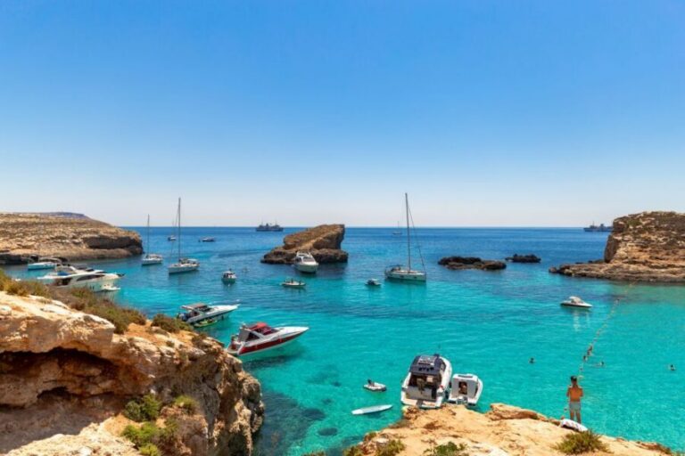 Malta: Blue Lagoon, Comino & St Paul's Islands Cruise - Cruising past Mellieha: the ride is part of the show