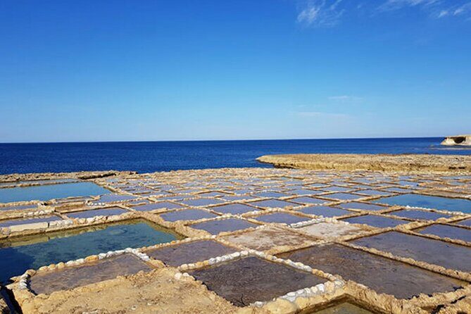 Malta: Gozo Full Day Buggy Tour with lunch and Comino Stop - Salt pans and Xwejni Bay: where the tour slows for real-time nature