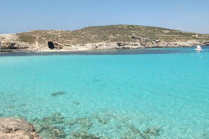 Malta Private Charter from Mellieha: Gozo, Comino, Blue Lagoon - Blue Lagoon Swim Time: Anchored for the Color, Not the Crowds