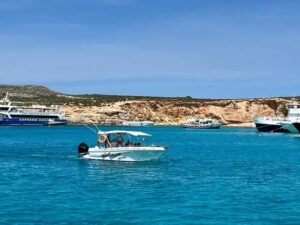 Mellieha: 1:00pm Speedboat round Comino Caves 2h Blue Lagoon - Getting underway at Blue Waves Watersports and Marfa Bay