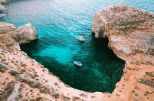 Mellieha: Round Comino, Blue Lagoon & Gozo Cruise with Water - The scenic cruise stretch: Saint Mary’s Battery, Elephant Rock, and the Santa Maria Caves