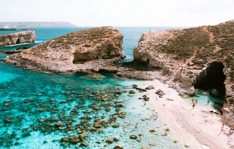 Mellieha: Round Comino, Blue Lagoon & Gozo Cruise with Water - Blue Lagoon swim stop: turquoise water, snorkel time, and the access pass rule
