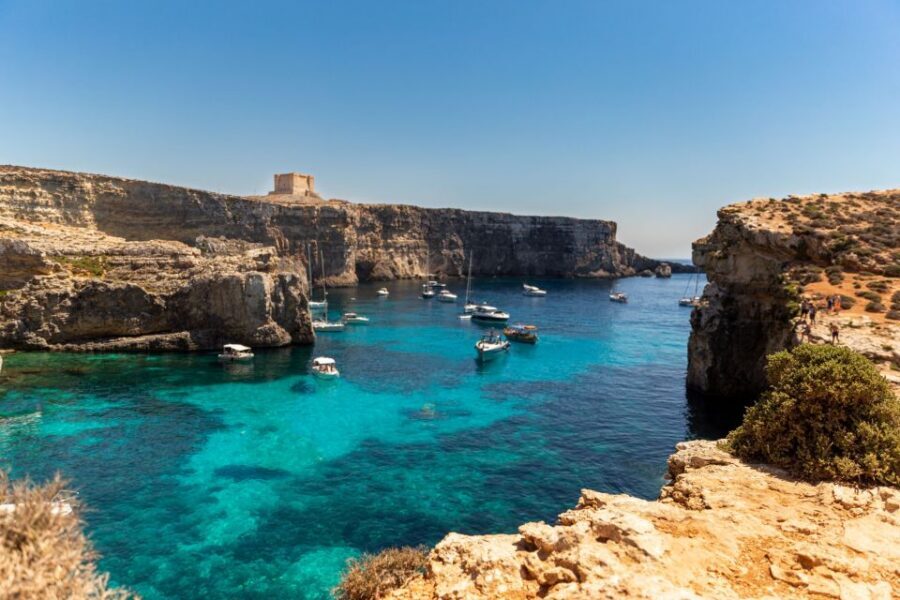 St Paul's Bay: Comino, Blue Lagoon, Gozo, & Caves Boat Tour - St Paul’s Island: Statue Ruins, Rock Views, and a Final Swim